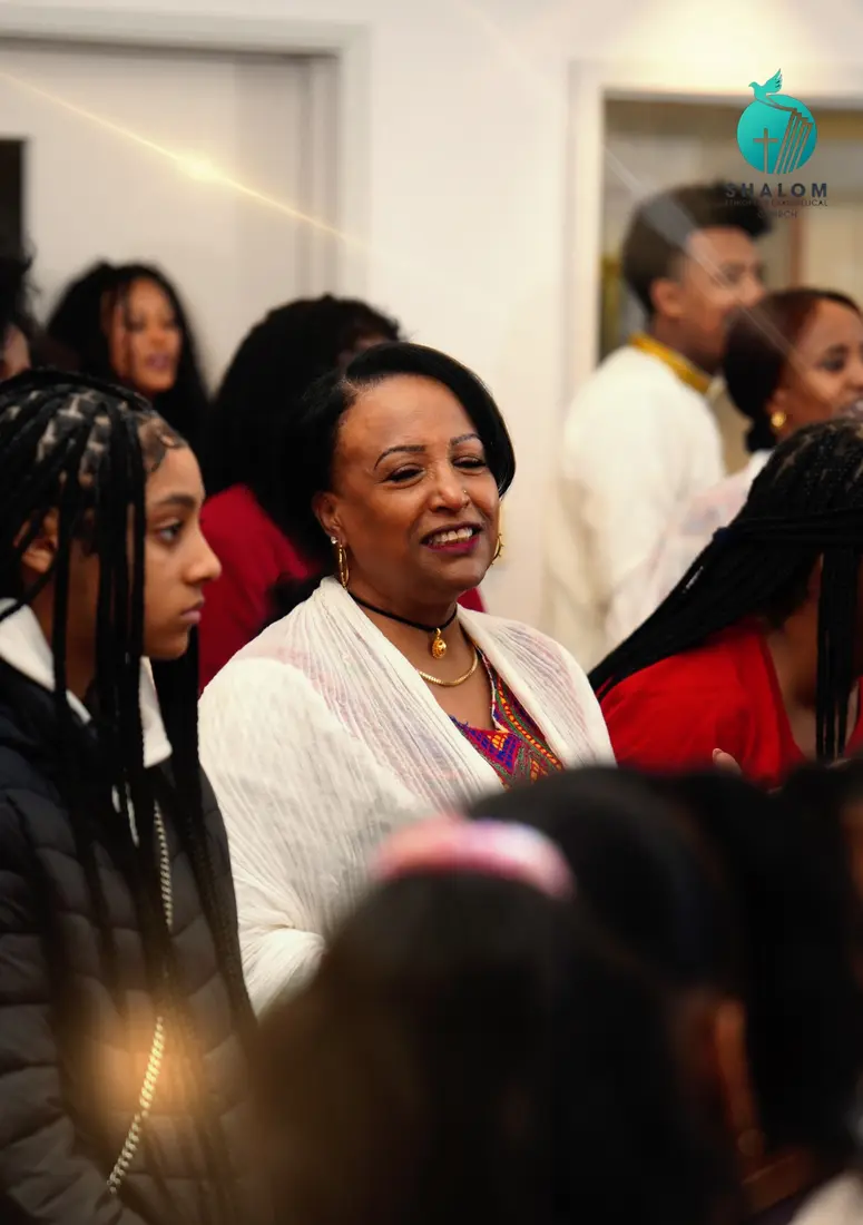 Members of the Shalom church community gathered together
